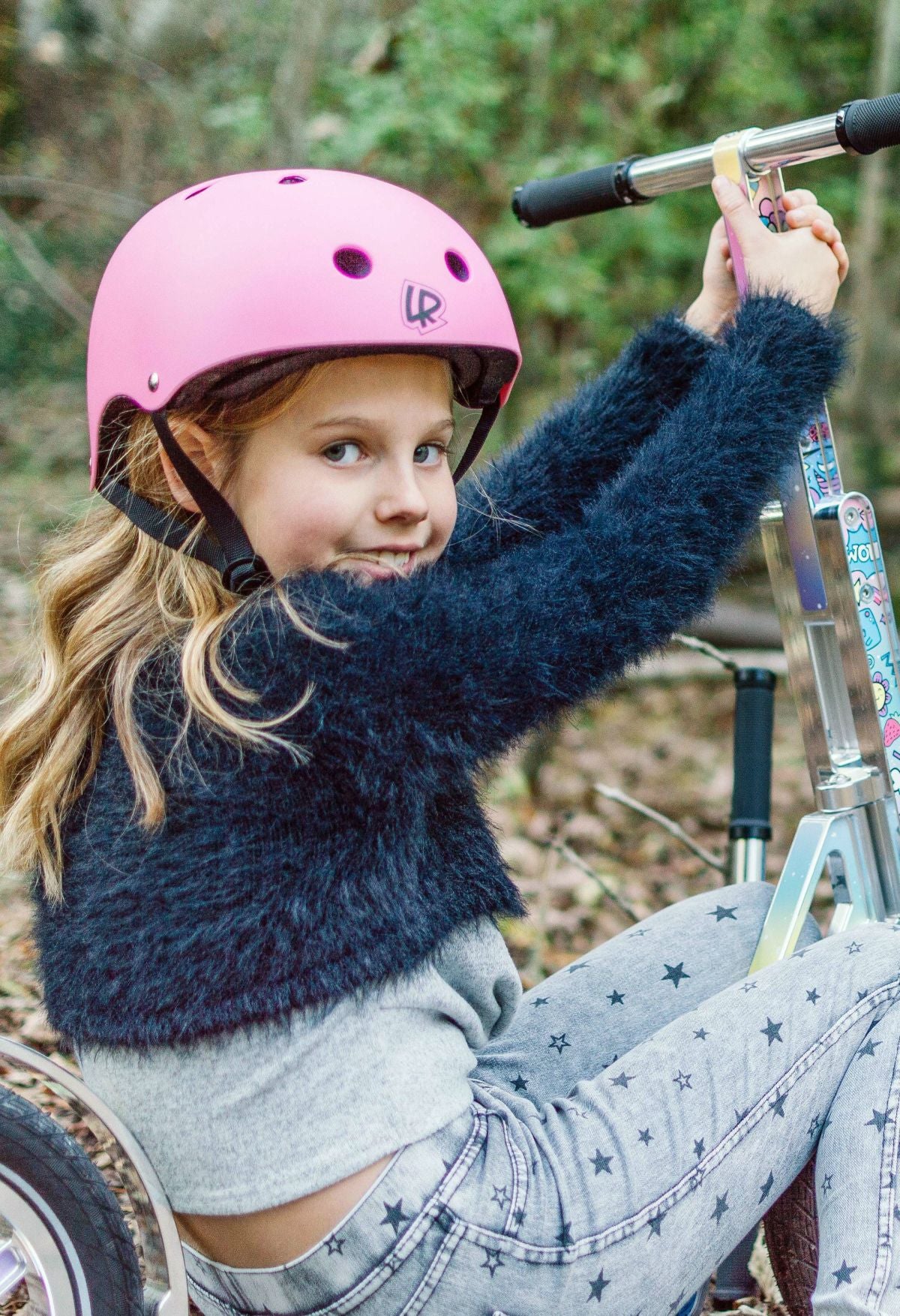 LIFERYDER test pilot with a kids scooter outdoors