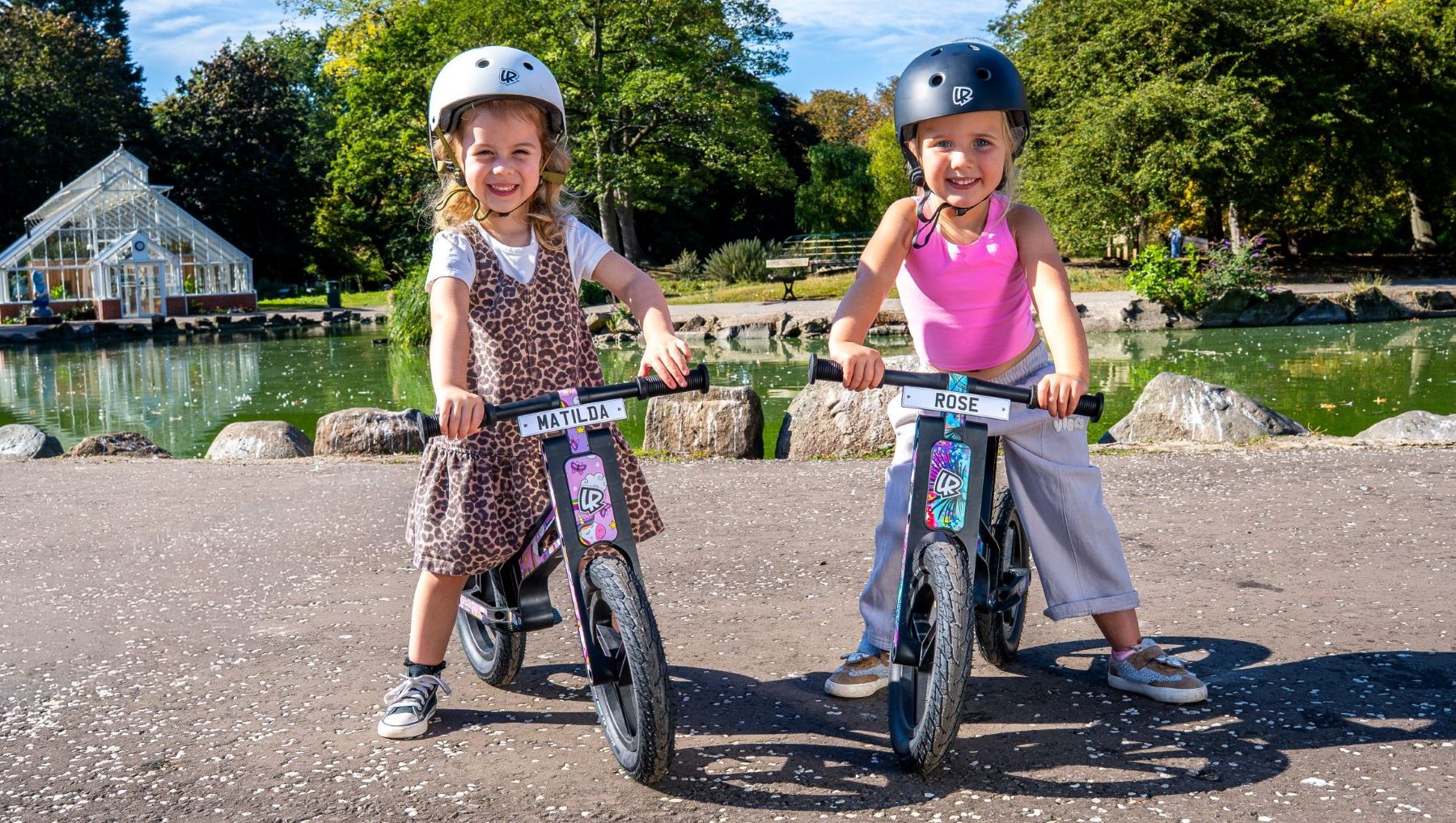 Children riding LIFERYDER VOGUE balance bikes in a park