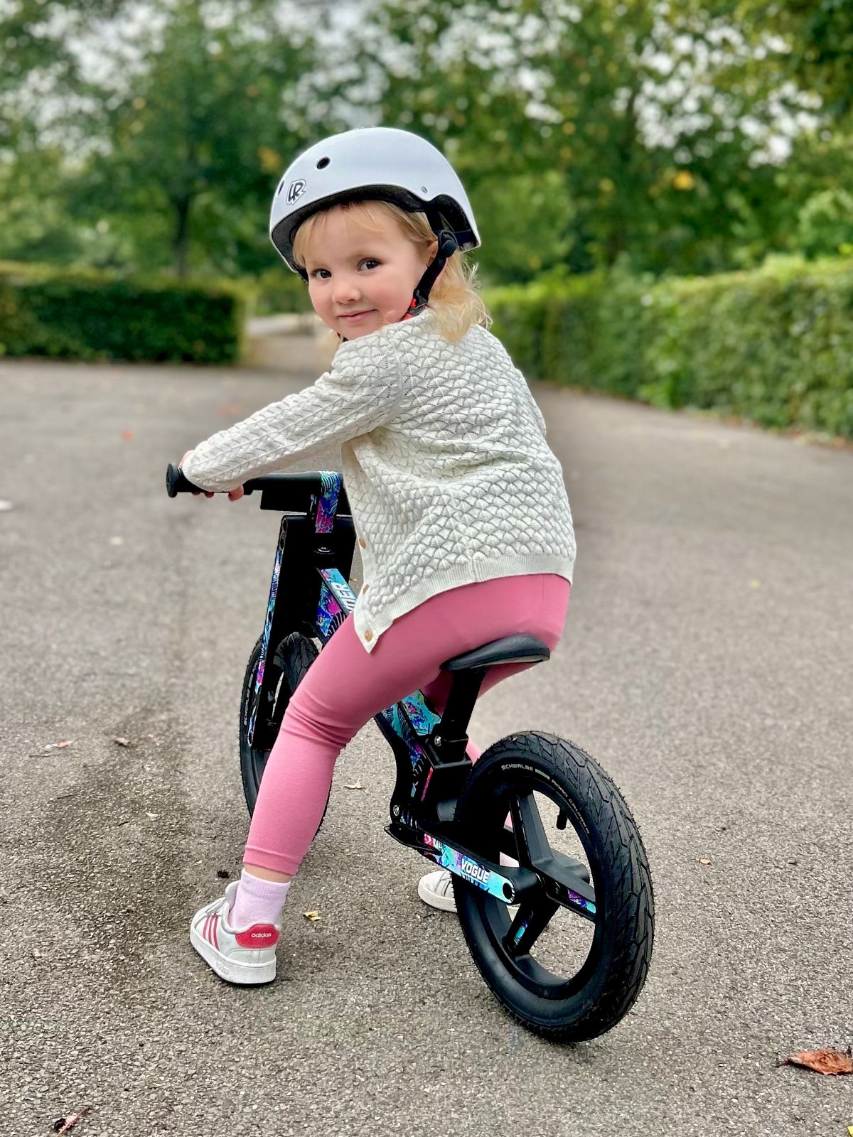 Girl riding a LIFERYDER VOGUE balance bike outdoors