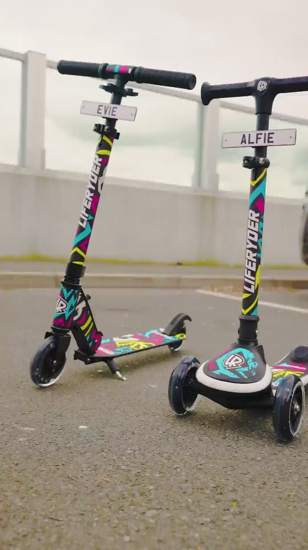Children riding LIFERYDER QUEST and HALO scooters together near Humber Bridge
