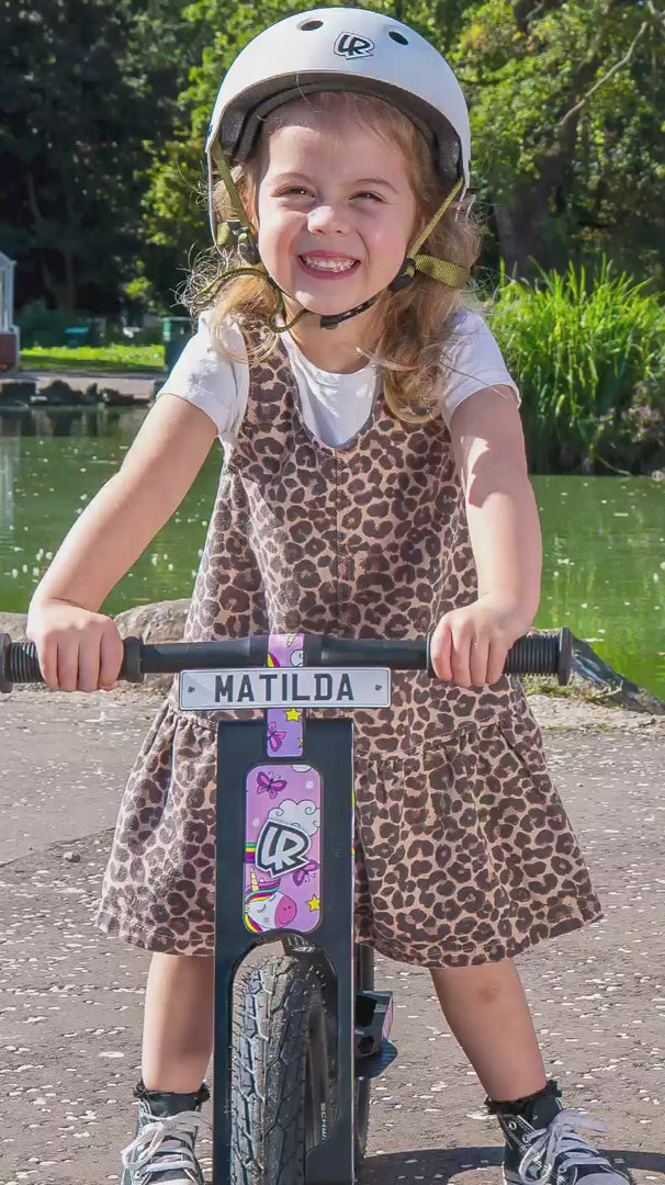 Load video: Children riding LIFERYDER VOGUE balance bikes together in a park